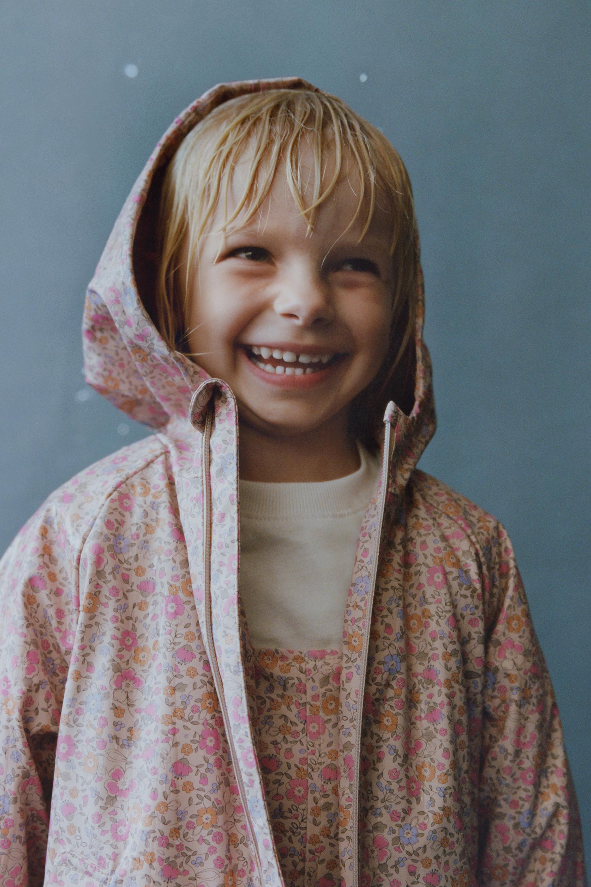 WATER RESISTANT PRINTED RUBBERIZED FLEECE LINED RAINCOAT